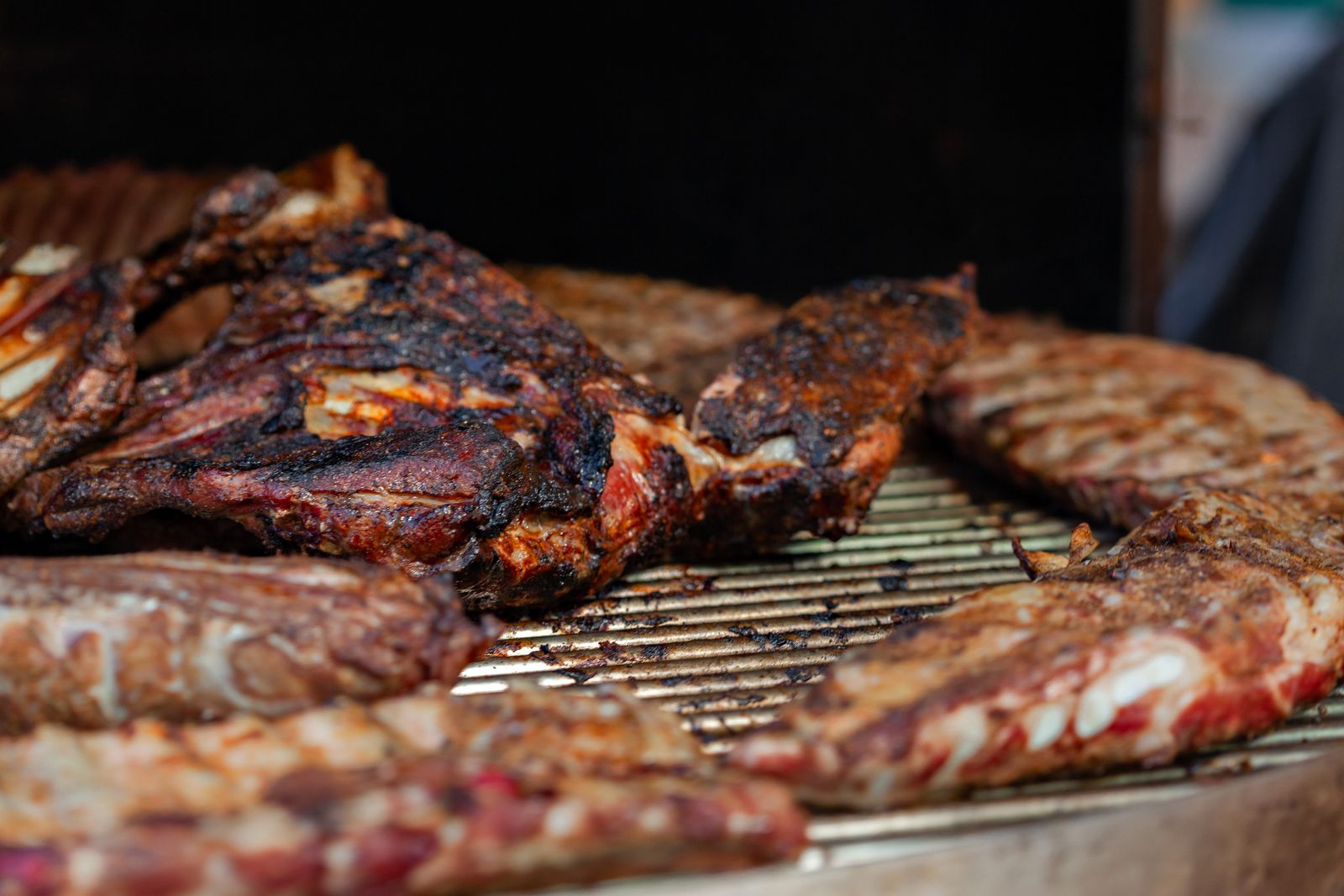 Charred smoked meat on the grill